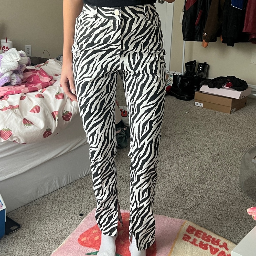 Zebra print straight leg jeans, split hem